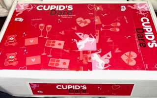 ands shuffling Cupid Dare cards before starting